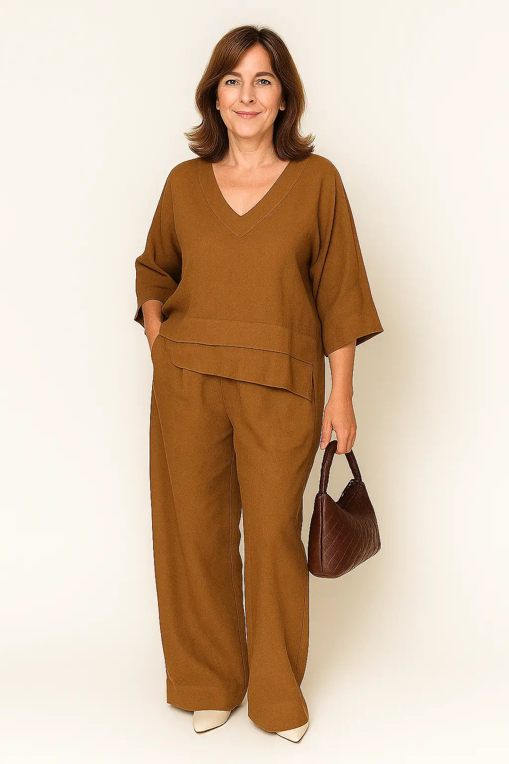 Conjunto feminino casual de algodão e linho com blusa de manga 3/4 e calça pantalona – ideal para primavera e verão.