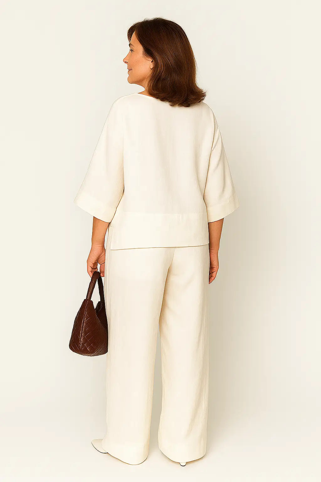 Conjunto feminino casual de algodão e linho com blusa de manga 3/4 e calça pantalona – ideal para primavera e verão.