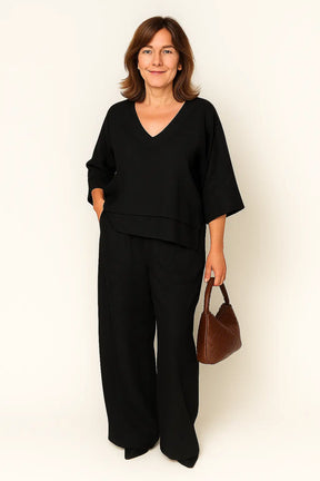 Conjunto feminino casual de algodão e linho com blusa de manga 3/4 e calça pantalona – ideal para primavera e verão.