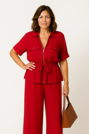 Conjunto feminino verão 2025 com casaco de zíper e calça larga, estilo casual moderno e elegante.