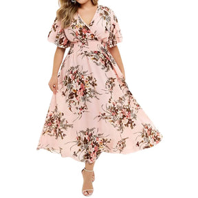 Vestido Aurora floral rosa com estampa lisa delicada, ideal para ocasiões casuais e elegantes, com mangas curtas e caimento leve para o verão.