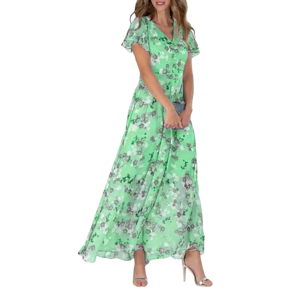 Vestido Aurora floral verde com estampa lisa delicada, ideal para ocasiões casuais e elegantes, com mangas curtas e caimento leve para o verão.