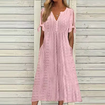 Vestido Aurora tricot rosa com estampa lisa delicada, ideal para ocasiões casuais e elegantes, com mangas curtas e caimento leve para o verão.